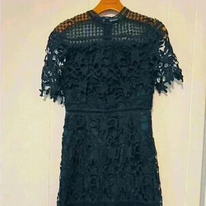 Chi Chi London lace high neck mini dress in green
